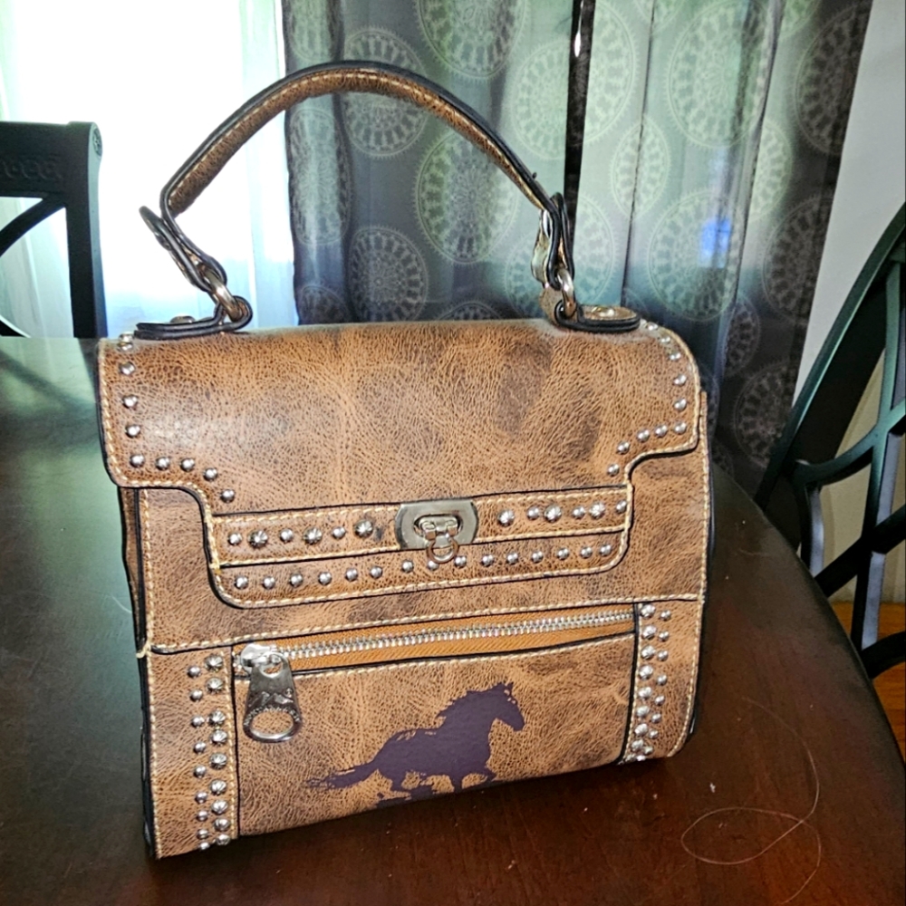 Montana West  satchel, 81/2 inches wide 8 inches tall. Cute horse ,lightweight.